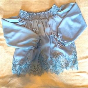 Off the shoulder, flow top